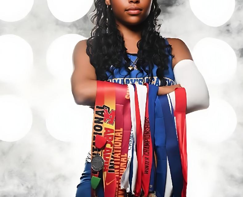 The Los Angeles Village Rises: Community Overrides System to Honor Track Star A’Shari Hobbs